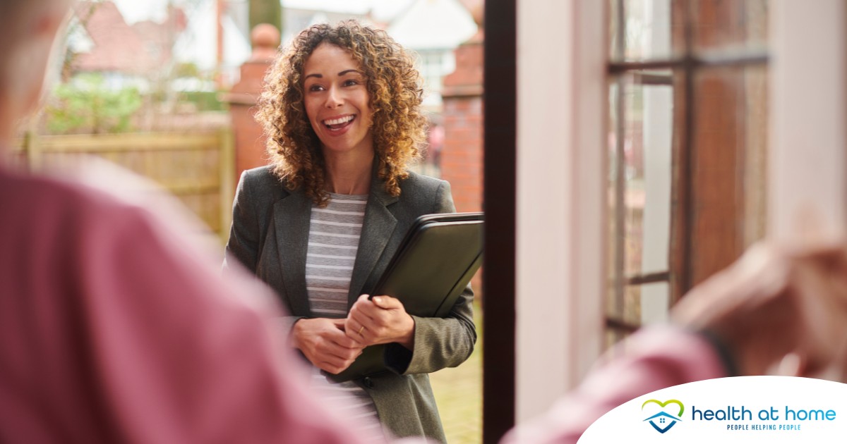 Medical social workers can make a massive difference for others, as represented by this professional visiting an older adult in the comfort of her own home.