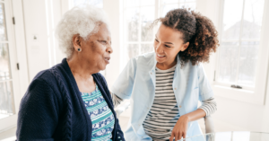 Adult child talking to elderly parent about in-home care