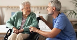 at home dementia caregiver providing companion care for dementia