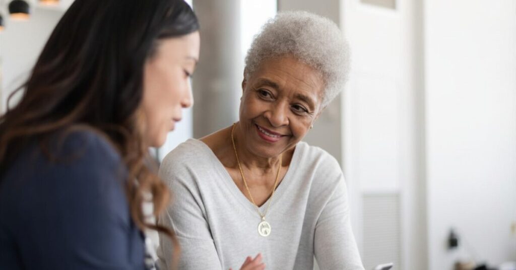 woman aging in place learning about home care agency