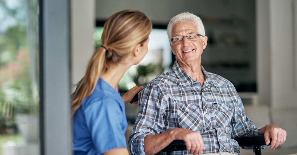 in home care indian river county providing personal care to elderly man in wheelchair