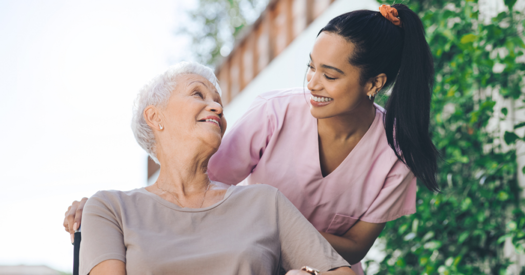 companion caregiver in florida shares moment with lonely elderly woman in wheelchair