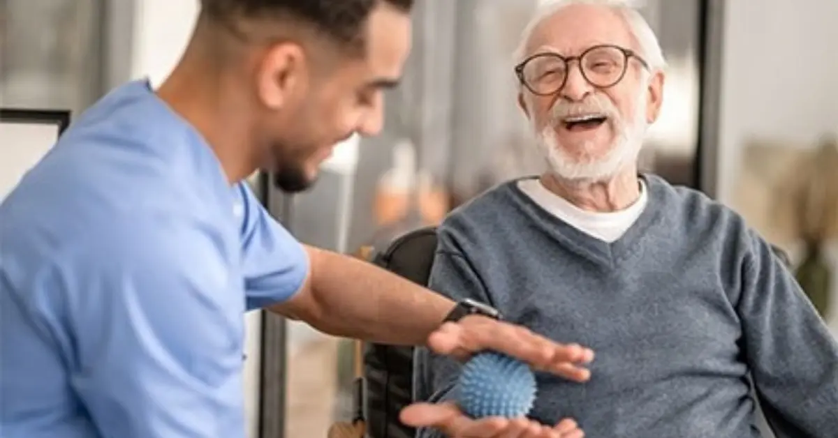 Therapist assisting elderly man with home health care in Florida