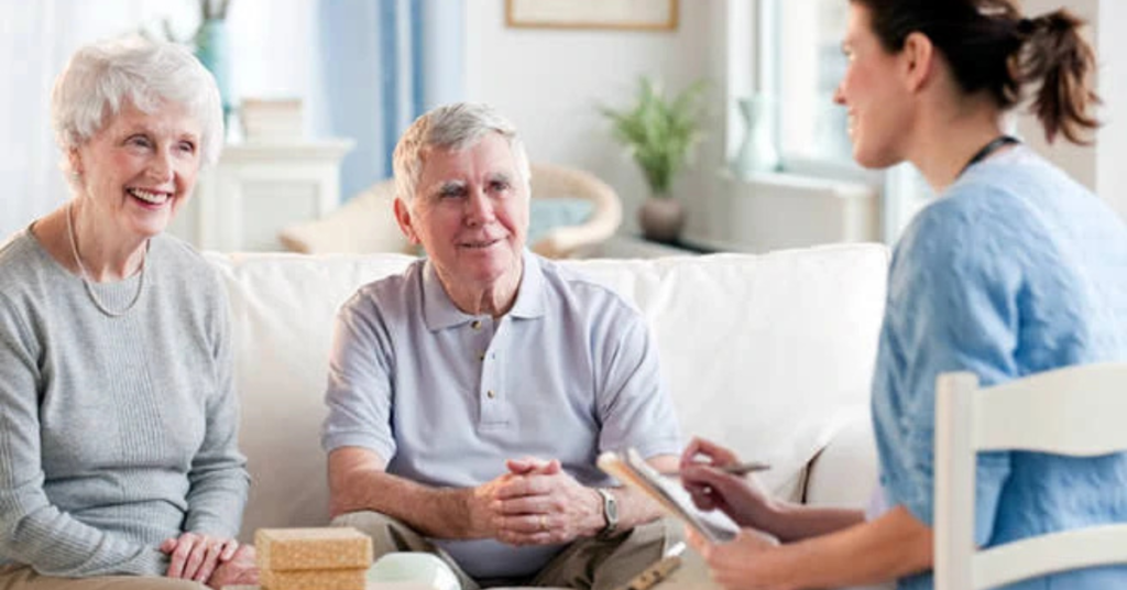 Elderly couple receiving in-home couples care from a nurse