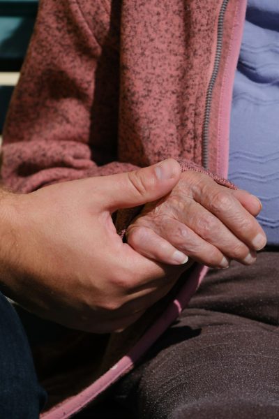 Caring hands, young and old, symbolizing home care in Sebastian.